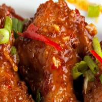 Sweet Thai Chili Wings · A simultaneously sweet, savory, tangy, and somewhat spicy wing also known as nam chim kai. S...