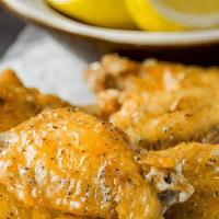 Lemon Pepper Wings · A mix of lemon zest and ground black pepper. The result melds the strong citrus notes of lem...