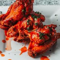 Hot/Buffalo Wings · A classic originating from Buffalo New York. Served with fries and Asian coleslaw.
8 wings