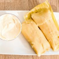 Tamales De Elote/Sweet Corn Tamales · Served with sour cream.