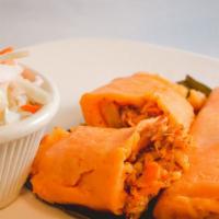 Tamales De Pollo/Chicken Tamales · With a variety of vegetables inside.