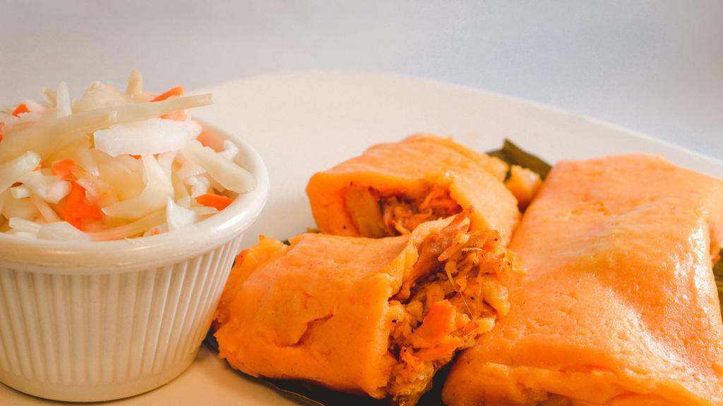 Tamales De Pollo/Chicken Tamales · With a variety of vegetables inside.