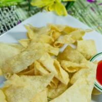 Fried Wontons · Vegetarian, NO FILLING. Wonton wrappers deep fried into chips, served with sweet & sour sauc...