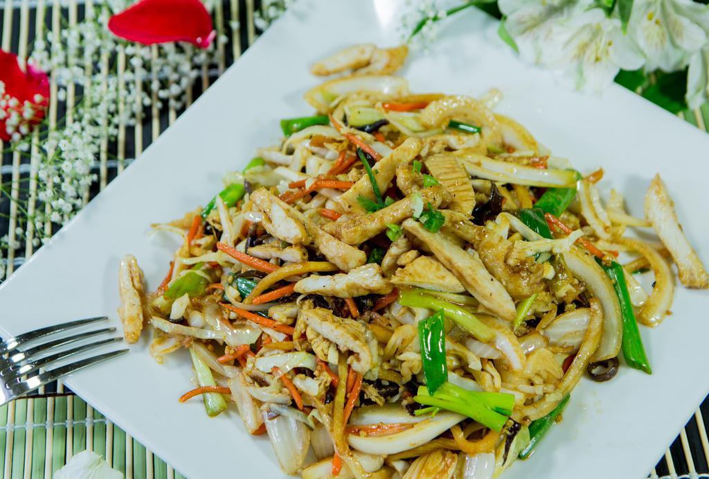 Mu Shu Chicken · Sliced chicken, scrambled egg, cabbage, onions, carrots and stir fried in house sauce. Optionally served with hoisin sauce and 5 thin Chinese pancakes.