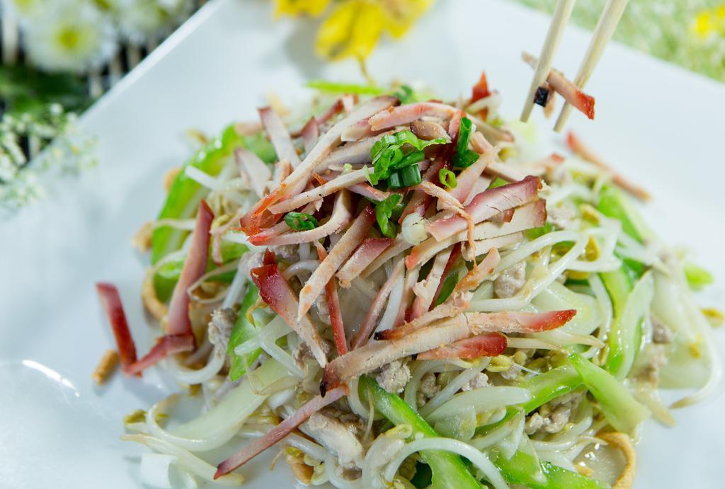 Pork Chop Suey · Pork, beansprouts, celery, and onions in a light sauce. NO dry noodles.