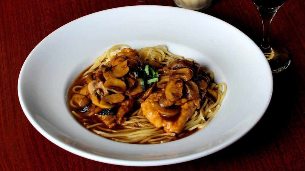 Chicken Marsala · Boneless breast of chicken sauteed with fresh mushrooms in a marsala wine sauce.  Served with a side of pasta.