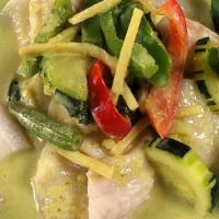 Green Curry · Coconut milk based green curry with bamboo shoot,  bell pepper, basil and green bean.