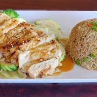 Chicken Teriyaki  · Grill chicken breast with teriyaki sauce on top serve with steam vegetables and white rice o...