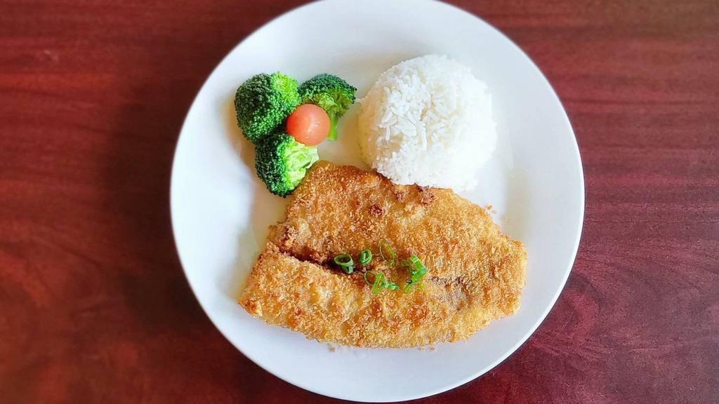 Fish Katsu  · Japanese style fried fish with panko bread crumb serve with white rice on the side.
