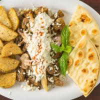 Mo'S Platter · Gyro lamb meat or chicken, topped with grilled onions, grilled mushrooms, feta cheese, tzatz...