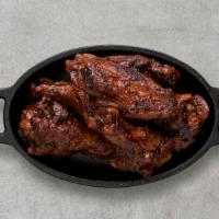 Jerk Boneless Wings · Served with celery or carrots, and blue cheese or ranch.