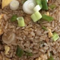 Chicken Fried Rice · Chicken sautéed with stir fried rice and a splash of soy sauce. Mix our delicious scrambled ...