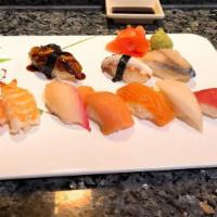 Sushi Dinner Regular · Include salad, chef choice fish. 8 pieces sushi and california roll.