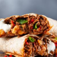 California Burrito · Our chorizo and ground beef mix (100% certified angus beef), green chili, cheese, fries, gua...