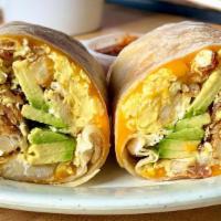 California Breakfast Burrito · Bacon, eggs and tater tots topped with cheese and sour cream.