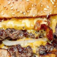 Bacon  Cheeseburger · A pair of fresh grilled patties with two slices of American cheese topped with two strips of...