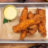 Buffalo Tenders · crispy chicken strips with buffalo sauce.  served with a choice of ranch or blue cheese