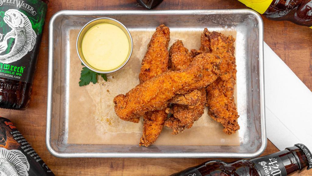 Buffalo Tenders · crispy chicken strips with buffalo sauce.  served with a choice of ranch or blue cheese