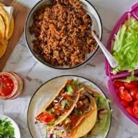 Family Meal - Taco Night · feast for 4 with a pound of smoked chicken and all the fixins for taco night at the house.  ...