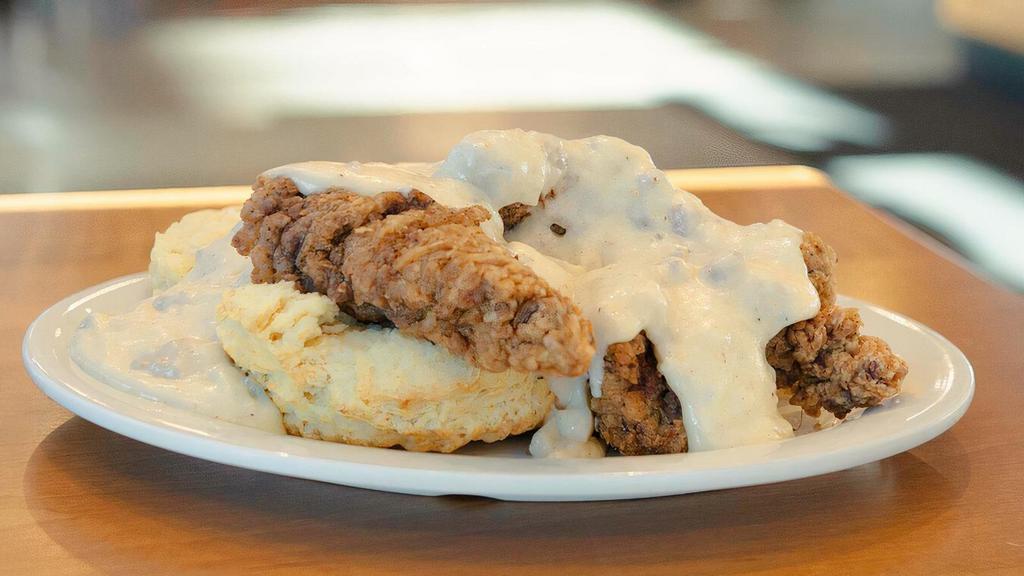 Steak & Gravy · Three pieces of our country fried steak, smothered in sausage or shiitake gravy, served open-faced on a flaky biscuit.