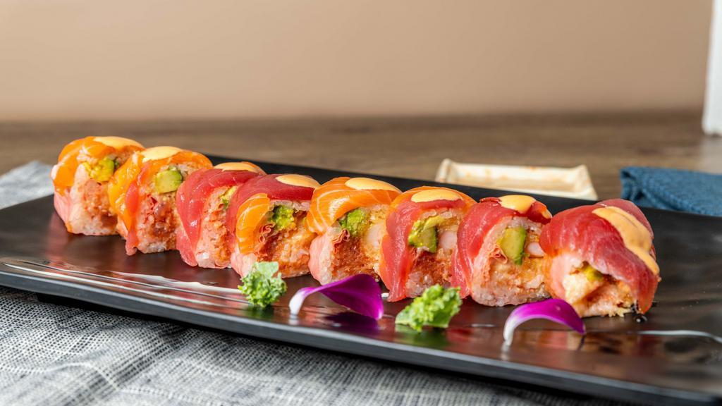 Love Roll · Spicy tuna, shrimp tempura, lobster salad, avocado inside. Top with tuna, salmon, finished with spicy mayo and eel sauce.