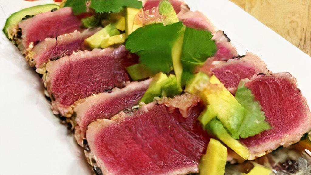 Tuna Tataki · Spicy. Seared tuna with ponzu sauce, topped with fish egg and scallion.