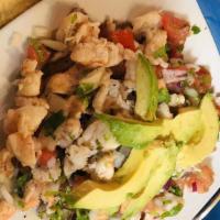 Tostadas De Ceviche · Delightful pieces of shrimp in a well-seasoned lime sauce, topped with pico de gallo and avo...
