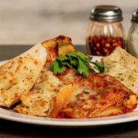 Baked Ziti · Ziti pasta tossed in our tomato sauce and ricotta, topped with mozzarella, then baked. Serve...