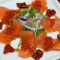 Salmon Carpaccio · Fresh salmon and vegetables with vinaigrette.

Consuming raw or undercooked meat, poultry, s...