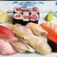 Deluxe Sushi Assortment · Chef`s choice 8 pcs sushi and tuna roll.