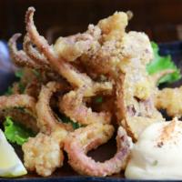 Squid Legs · Fried with soy ginger batter.