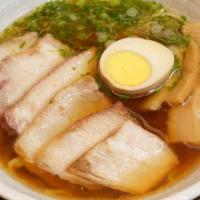 Chashu Ramen · In soy soup with extra chashu pork, boiled egg, bamboo shoots & scallion.