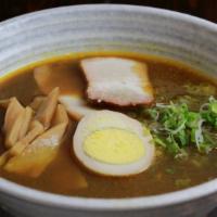 Curry Soy Ramen  · Spicy. In spicy curry soy soup with chashu pork, bamboo shoots & scallion.