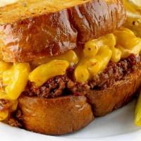 Chili Mac Grilled Cheese · Our signature chili and mac & cheese loaded between two slices of buttered bread and grilled...