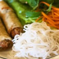 Goi Cuon - Spring Roll (2) · Pork shrimp, vermicelli noodles and fresh mint wrapped in rice paper, served with house pean...