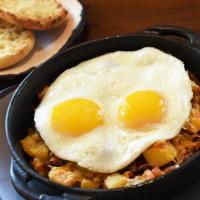 Matt'S Meaty Skillet · Now meatier than ever! Harbor potatoes, bacon, ham , sausage and Jack & Cheddar cheeses, top...