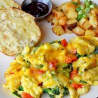 Create Scrambler · Made with three cage free eggs and a choice of three ingredients. Served with Harbor potatoe...