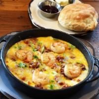 Southern Shrimp & Grits · Shrimp, bacon, green onion, Jack & Cheddar cheeses and cilantro on a bed of stone-ground gri...