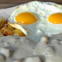 Down Home Biscuits & Gravy · Pork sausage gravy and biscuits. Served with two cage free eggs, any style and Harbor potato...