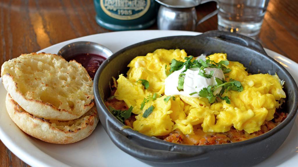 Habanero Hash & Eggs · Habanero hash prepared in house with chorizo, peppers and onions, topped with Jack & Cheddar cheeses, two cage free eggs, any style, sour cream and cilantro. Served with a buttered English muffin and house-made jam.