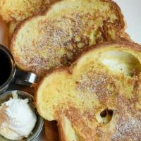 Texas French Toast · Topped with cinnamon sugar. Make it a combo with a smaller portion of French toast, two cage...