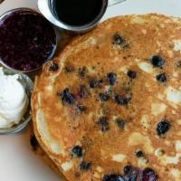 Blueberry Pancakes · Served with blueberry compote. Make it a combo with a smaller portion of pancakes, two cage ...