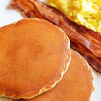 Kid'S Itsy Bitsy Pancakes · Two small pancakes served with a scrambled egg and a sausage link or two strips of bacon.