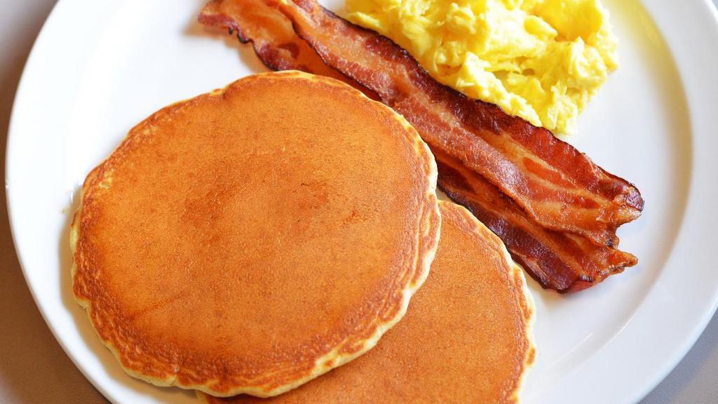 Kid'S Itsy Bitsy Pancakes · Two small pancakes served with a scrambled egg and a sausage link or two strips of bacon.