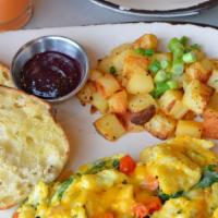 Gluten-Free Create Scrambler · A choice of three ingredients scrambled into three cage free eggs. Served with Harbor potato...