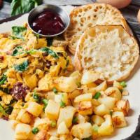 Santorini Scrambler · Three cage free eggs scrambled with chicken sausage, sun-dried tomatoes, spinach, and feta c...