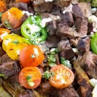 Latino Steak Frites · 10 oz. Grass Fed Argentinian Beef Churrasco | Chimichurri | Battered House Fries