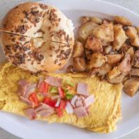 Western Omelette · Eggs with ham, red and green bell peppers, and onions.