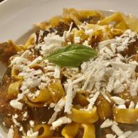 Pappardelle Alla Norma · Pappardelle pasta, eggplant, salty ricotta cheese, basil, tomato sauce