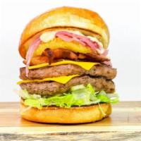 Bbq Bacon Cheeseburger · Two 3oz. Smash patties topped with bacon, American cheese, onion ring, caramelized onion, AE...